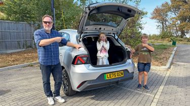 MG4 Urban - boot open with family