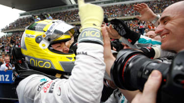 Nico Rosberg celebrates his first win