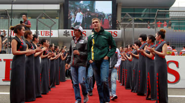 Sergio Perez and Vitaly Petrov after the driver parade