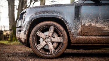 Land Rover Defender 130 P500 AWD - muddied wheel