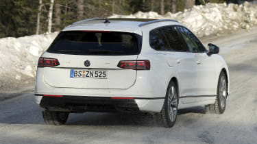 Volkswagen Passat estate (white with camouflage) - rear