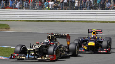 Kimi Raikkonen and Mark Webber battle