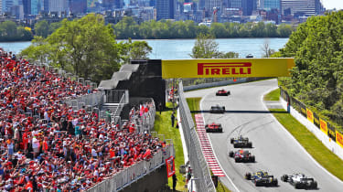 Formula 1 cars crossing start line