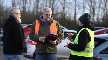 Dean gibson, Chris Rosamond and Paul Barker discussing touchscreen test results