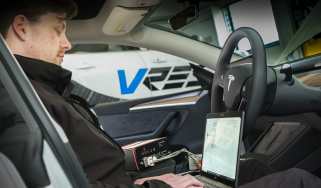 Cyber crime - car connected to a laptop