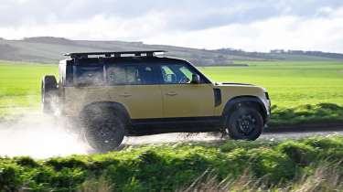Land Rover Defender 110 Trophy Edition - side action