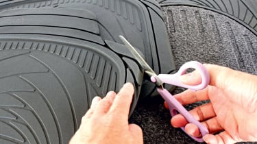 Trimming a floor mat