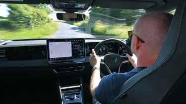 Auto Express chief reviewer Alex Ingram driving the Volkswagen Tiguan R-Line 2.0 TSI 4Motion