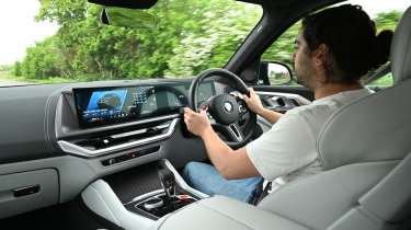 Jordan Katsianis driving the BMW XM Label