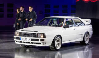 ABT representatives standing next to the ABT Audi Quattro