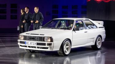 ABT representatives standing next to the ABT Audi Quattro