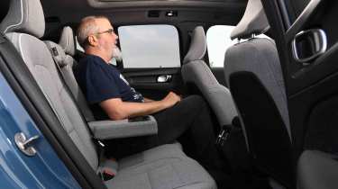 Volvo EX40 - rear seats with Senior test editor, Dean Gibson