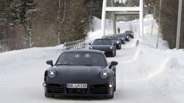 Convoy of 2023 Porsche 911 test cars