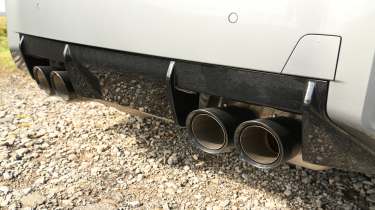 New BMW M2 being driven in the UK - exhaust pipes