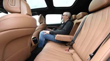 Mercedes E-Class Estate - rear seats with Senior test editor, Dean Gibson