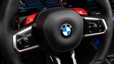 BMW M5 - steering wheel buttons