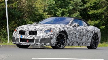 BMW M8 spy shot front quarter