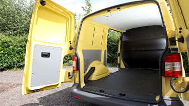 Volkswagen Transporter rear doors open with cargo bed