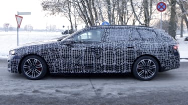 BMW i5 (camouflaged) - side