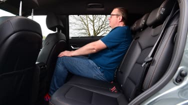 Auto Express editor-at-large John McIlroy sitting in the KGM Torres&#039; back seat