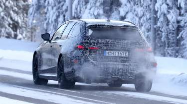 New BMW M5 Touring spy shot - rear tracking