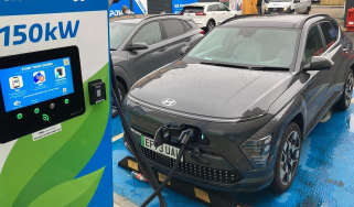 Hyundai Kona Electric connected to rapid charger