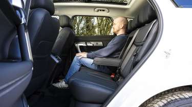 Jaecoo 7 and Skoda Kamiq - Jaecoo 7 rear seats being sat in by Auto Express chief reviewer Alex Ingram 