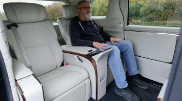 Auto Express senior road test editor Dean Gibson sitting in the Lexus LM&#039;s rear seat