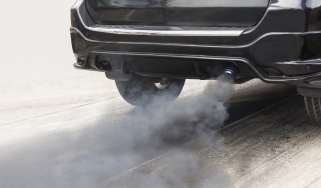 Car exhaust emitting grey smoke