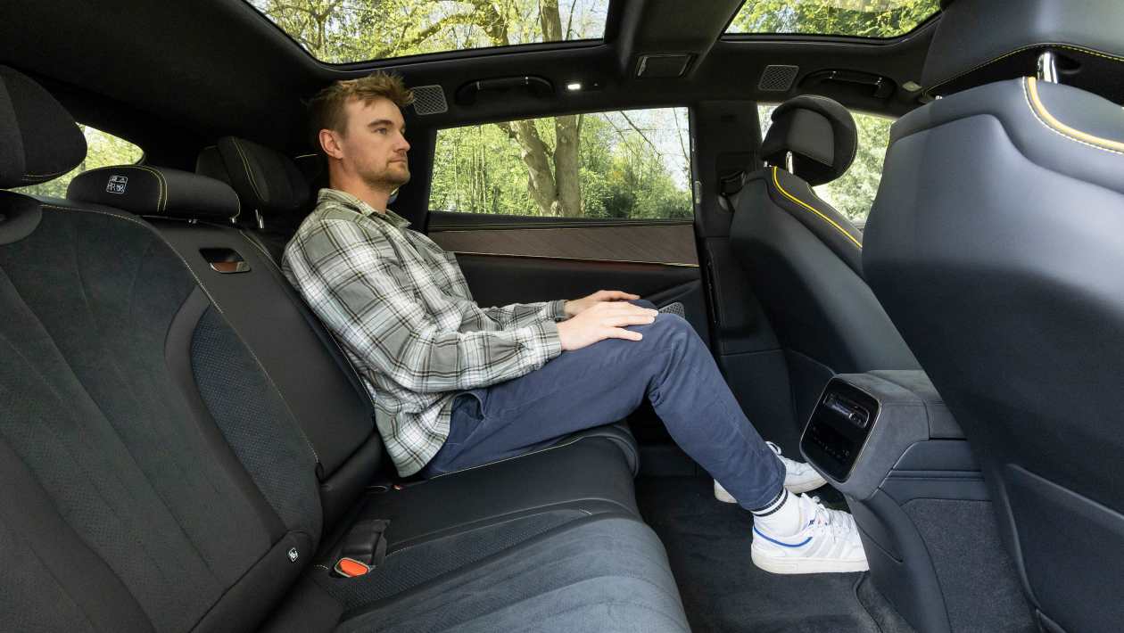 Denza Z9GT rear passenger space with adult seated in back