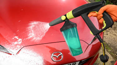 Auto Express Product Awards 2026 - products editor Tom Barnard washing his car using the AVA Premium Foam Cannon kit snow foam lance