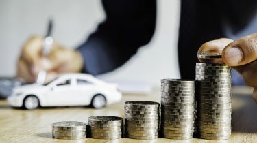 Coin pile and model car