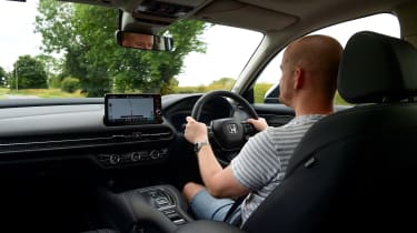 Auto Express chief reviewer Alex Ingram driving the Honda ZR-V in the UK