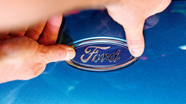 Ford badge being applied