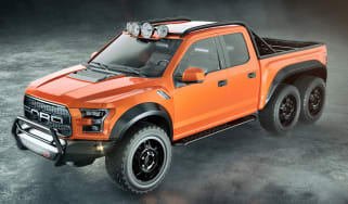 Hennessey VelociRaptor 6x6 - orange front quarter