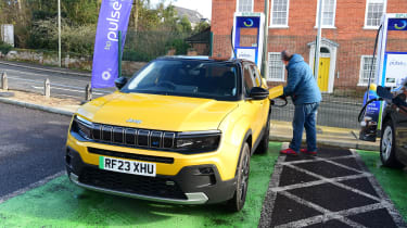 Auto Express editor-at-large John McIlroy connecting a BP Pulse charging station to the Jeep Avenger