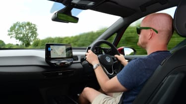 Auto Express chief reviewer Alex Ingram driving the facelifted Volkswagen ID.3 in the UK