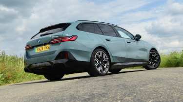 BMW i5 Touring - rear static