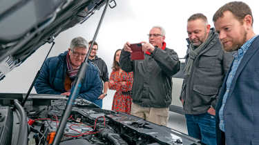 Dacia owners inspecting the Dacia Duster&#039;s engine bay