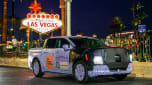Ford Fathom prototype driving past the Las Vegas sign