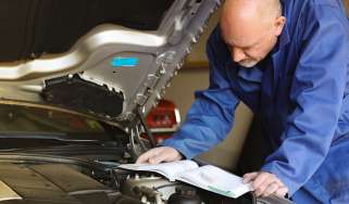 Mechanic working on a car