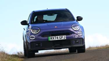 Abarth 600e Scorpionissima - front cornering 
