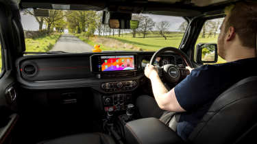 Auto Express news reporter Ellis Hyde driving the Jeep Wrangler Rubicon