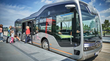 Mercedes-Benz Future Bus - loading passengers