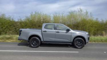 New Isuzu D-Max EV - side action 