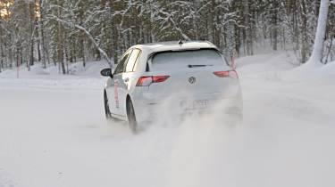 VW Golf in snow - rear