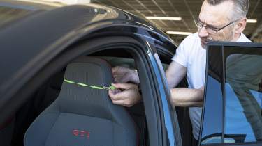 Auto Express Summer Tyre Test 2025 - John Barker setting up in-cabin testing equipment 