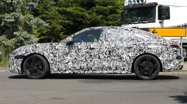 Audi A5 Sportback (camouflaged) - side action