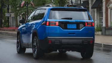 New Jeep Cherokee - blue dynamic rear 3/4 in the wet