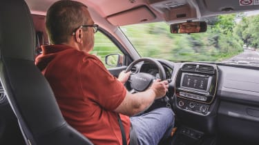 Editor-at-Large John McIlroy driving the Dacia Spring